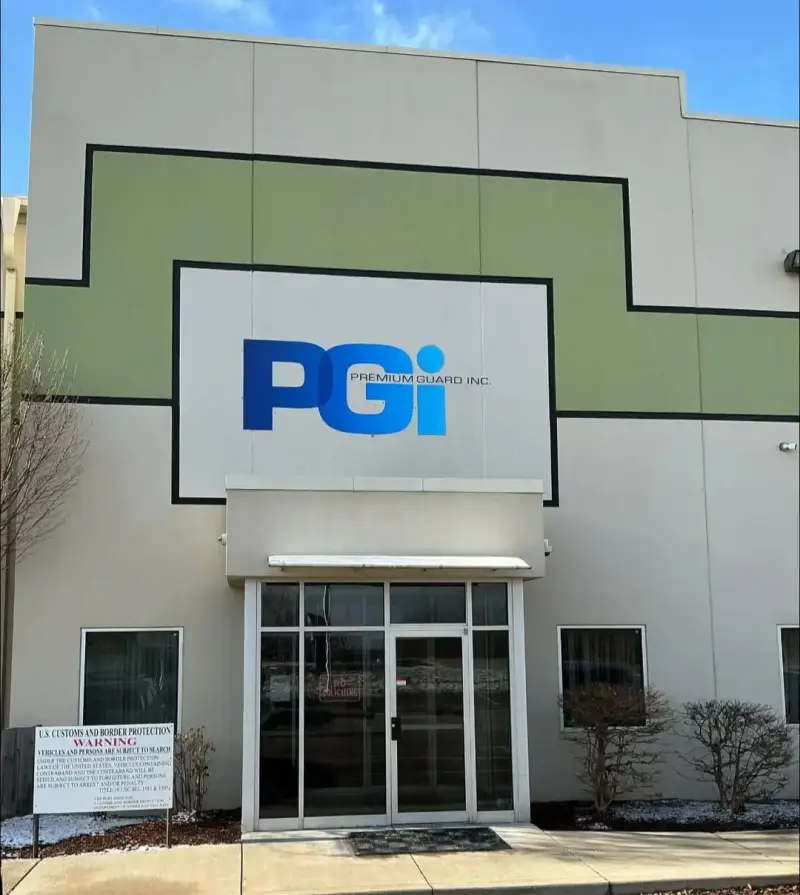 Dimensional PGI logo mounted to a building facade