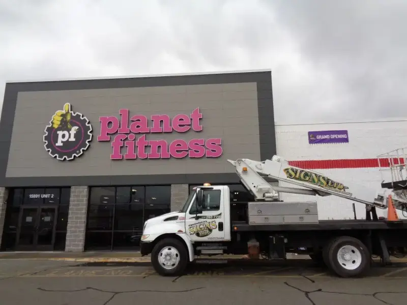 Channel letter installation at Planet Fitness